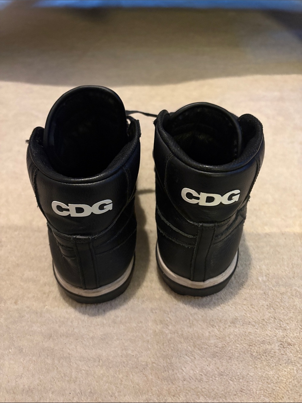 COMME DE GARÇONS NIKE Black High-Top Sneakers